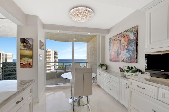 dining space featuring expansive windows