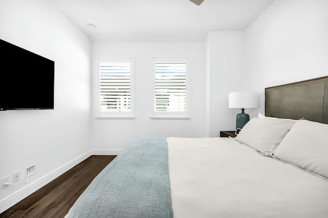 bedroom featuring dark hardwood / wood-style flooring