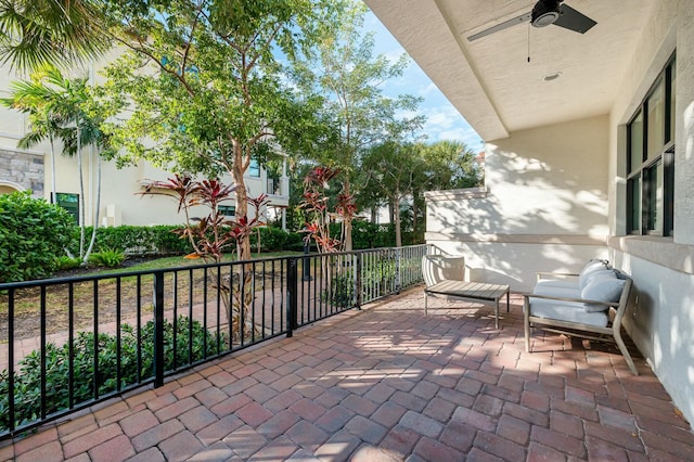 view of patio featuring ceiling fan