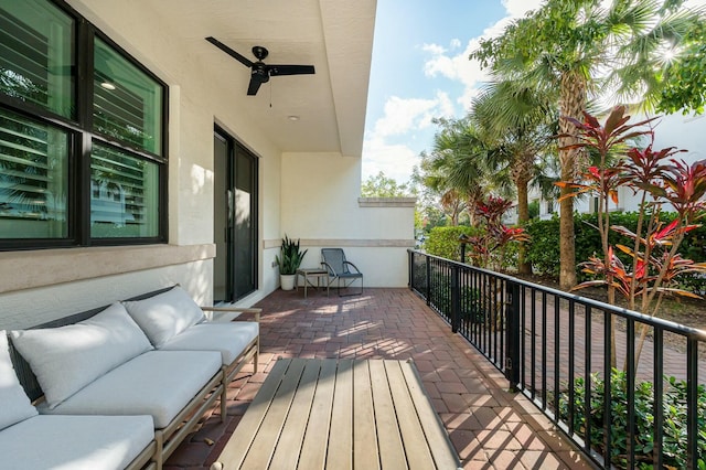 wooden deck with ceiling fan