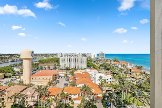 aerial view featuring a water view and a view of the beach