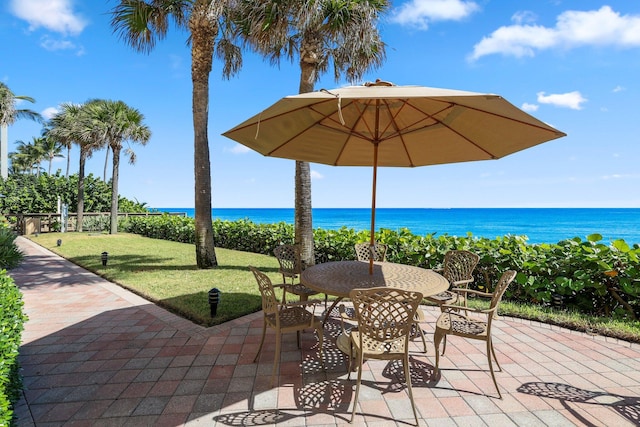 view of patio featuring a water view