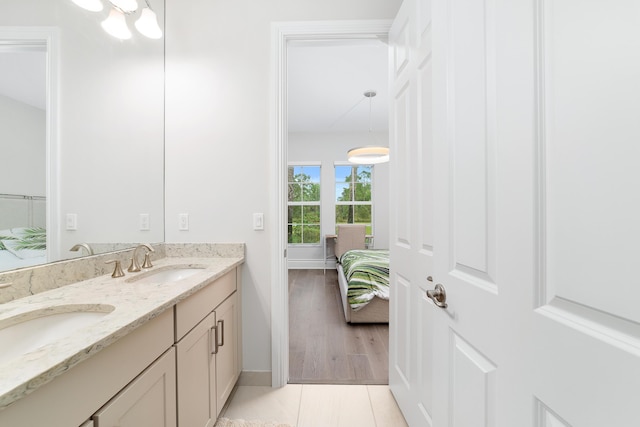 bathroom featuring tile patterned floors and vanity