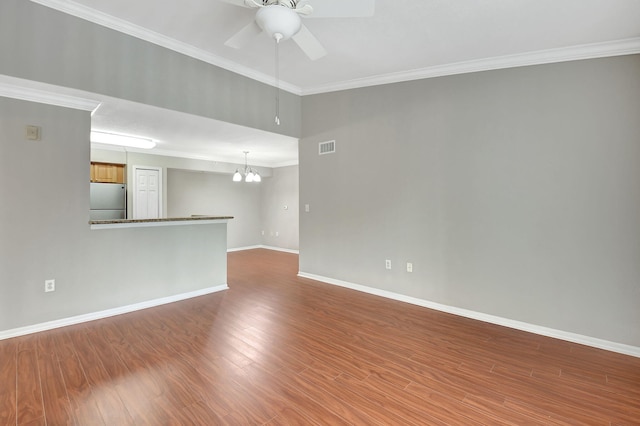 15155 Michelangelo Blvd Unit 201, Delray Beach, FL 33446 - spare room featuring visible vents, baseboards, wood finished floors, and ceiling fan with notable chandelier