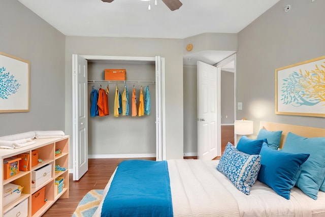 15155 Michelangelo Blvd Unit 201, Delray Beach, FL 33446 - bedroom with a closet, wood finished floors, baseboards, and a ceiling fan