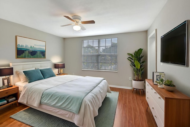 15155 Michelangelo Blvd Unit 201, Delray Beach, FL 33446 - bedroom with ceiling fan, baseboards, and wood finished floors
