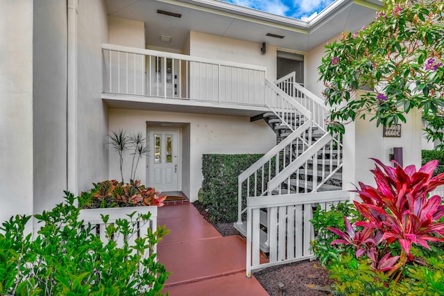 property entrance with a balcony