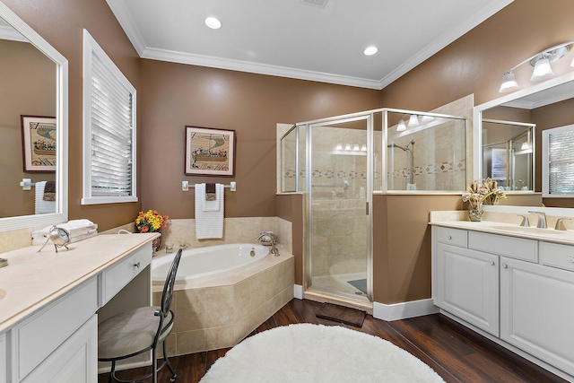 bathroom with vanity, crown molding, shower with separate bathtub, and hardwood / wood-style flooring