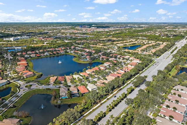 drone / aerial view with a water view