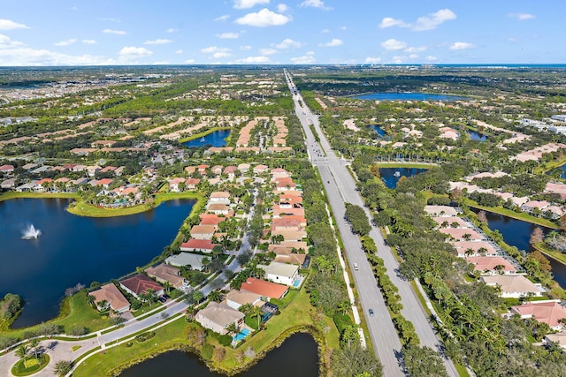 drone / aerial view with a water view