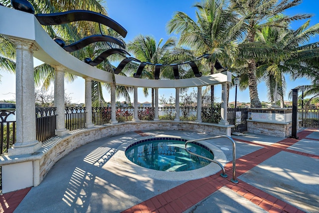 view of pool with a community hot tub