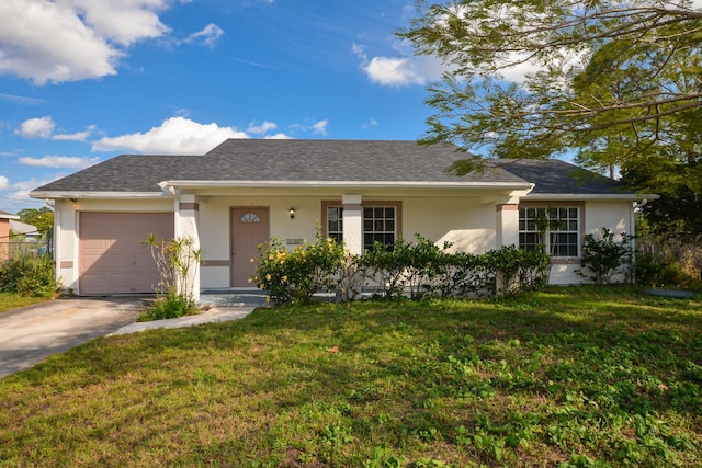 ranch-style home with a front yard and a garage