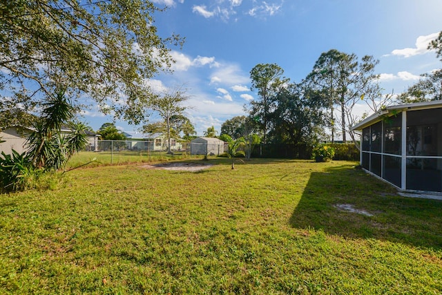 view of yard with a sunroom