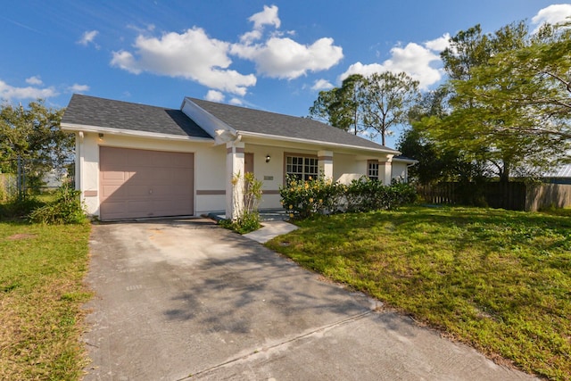 ranch-style home with a front yard and a garage