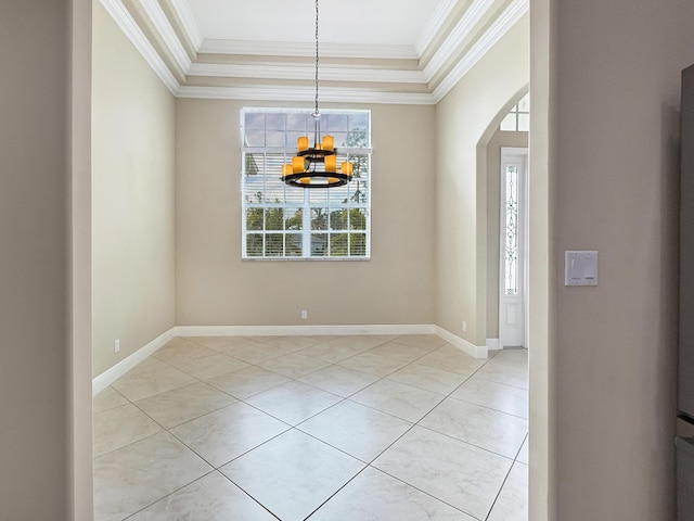 interior space featuring ornamental molding, light tile patterned floors, and a chandelier