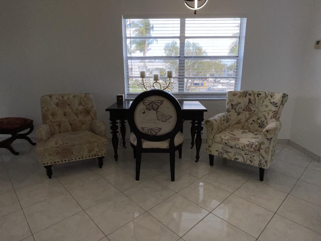 sitting room with light tile patterned floors