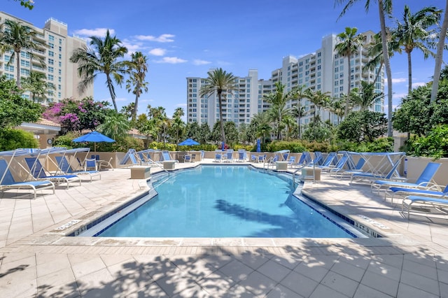 view of swimming pool featuring a patio area