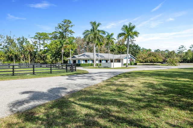 view of front of home with a front lawn