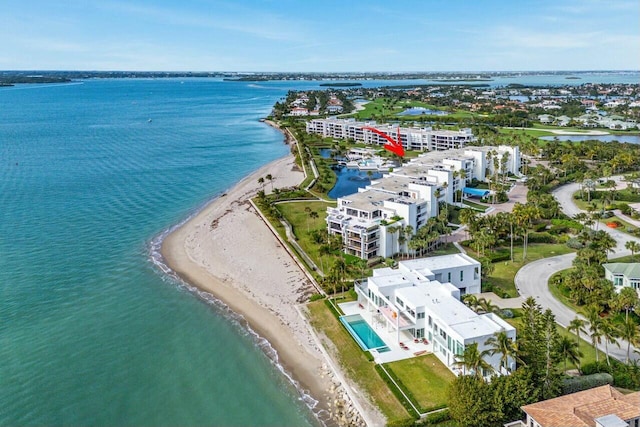 aerial view featuring a water view and a beach view