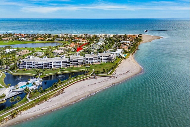 aerial view featuring a view of the beach and a water view