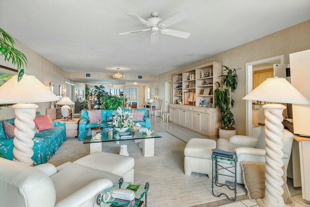 living room featuring ceiling fan