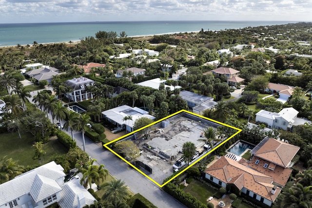 aerial view with a residential view and a water view