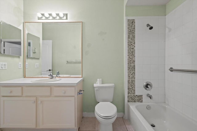 full bathroom with toilet, tiled shower / bath combo, tile patterned floors, and vanity