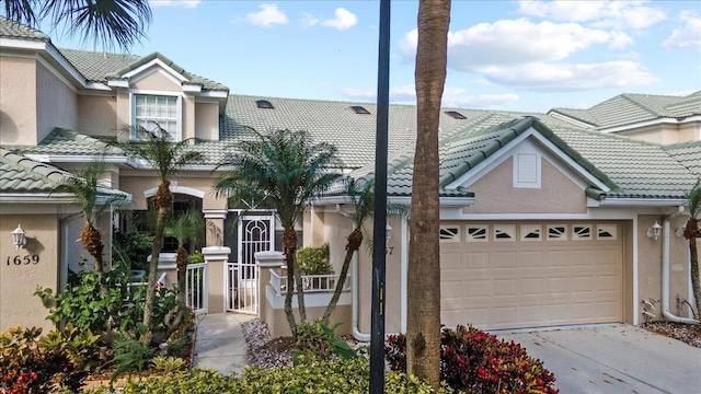 view of front of property featuring a garage