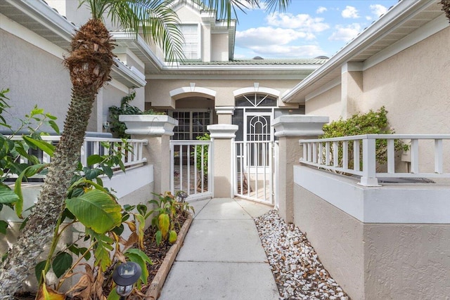 entrance to property featuring cooling unit