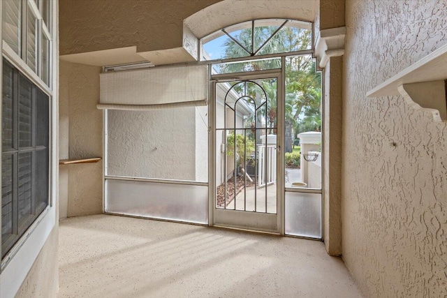 interior space featuring a towering ceiling