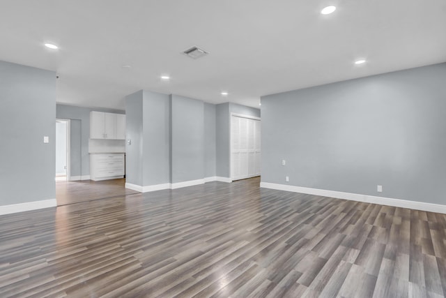 unfurnished room featuring wood-type flooring