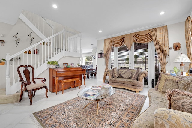 living room with ornamental molding