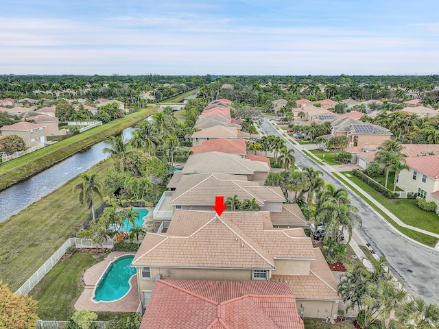 drone / aerial view with a water view