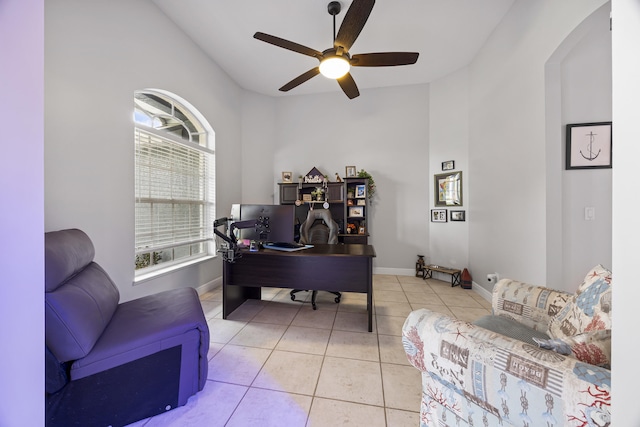 office space with ceiling fan and light tile patterned floors