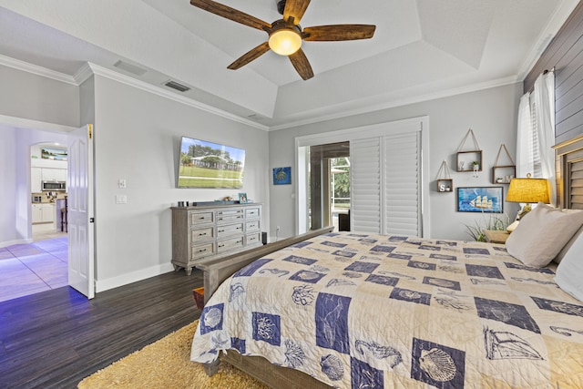 bedroom featuring dark hardwood / wood-style flooring, a raised ceiling, access to outside, ceiling fan, and crown molding