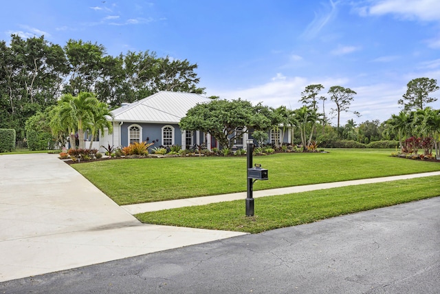 view of front of property with a front lawn