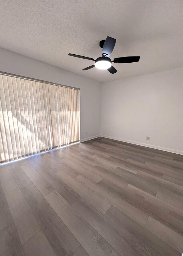 full bathroom featuring toilet, tile patterned flooring, tiled shower / bath combo, and vanity