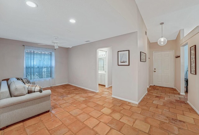 living room with ceiling fan