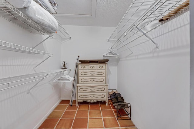 walk in closet featuring tile patterned floors