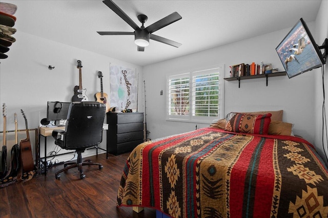 bedroom featuring dark hardwood / wood-style floors and ceiling fan