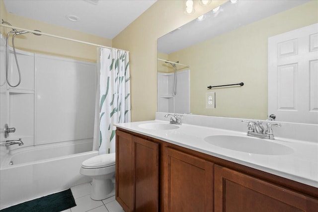 full bathroom featuring shower / tub combo with curtain, vanity, tile patterned floors, and toilet