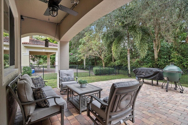 view of patio / terrace featuring ceiling fan and outdoor lounge area