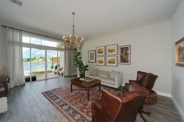 living room featuring an inviting chandelier