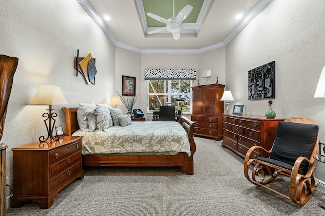 carpeted bedroom with ceiling fan and ornamental molding