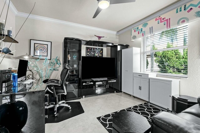 office area with ceiling fan, light tile patterned flooring, and crown molding