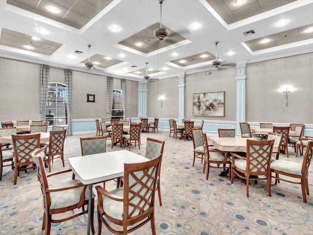 dining area with ceiling fan, crown molding, coffered ceiling, and decorative columns