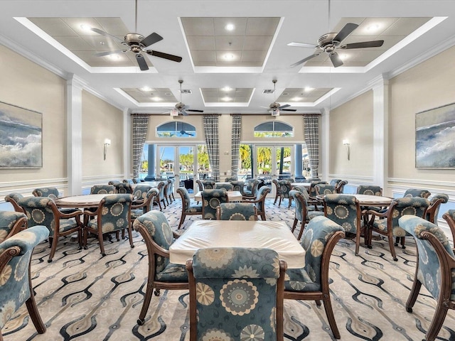 dining space featuring ornamental molding, french doors, and coffered ceiling