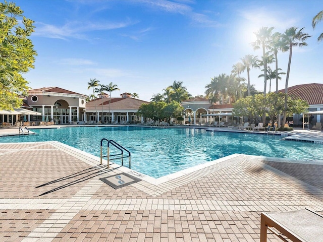 view of pool featuring a patio area