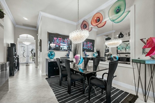 dining area featuring ornamental molding, tile patterned floors, and a notable chandelier