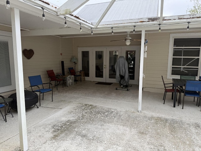 view of patio featuring french doors and ceiling fan